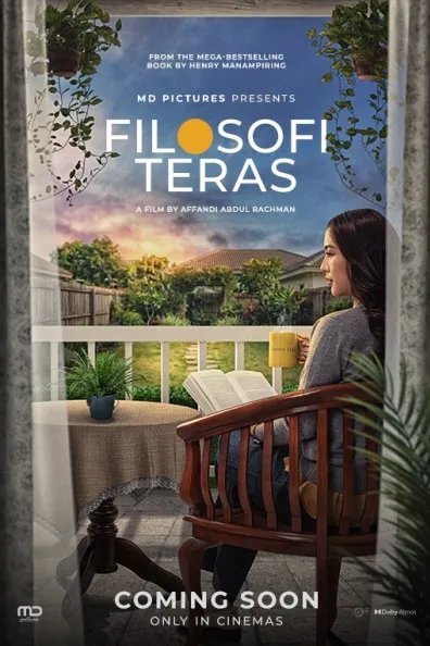 Poster resmi Filosofi Teras (2026): seorang perempuan duduk di kursi kayu di teras menghadap taman sambil memegang cangkir kuning dan buku terbuka, dengan tulisan coming soon only in cinemas