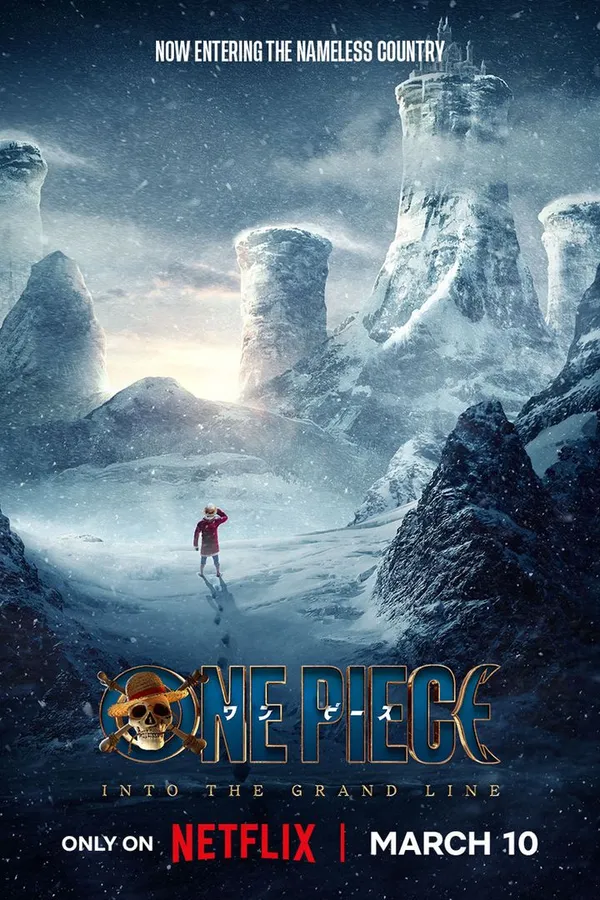 Poster resmi One Piece (Live Action) (2023): poster musim kedua Into the Grand Line, Luffy berdiri sendirian di lembah bersalju di antara tebing es menjulang, dengan jejak kaki di belakangnya
